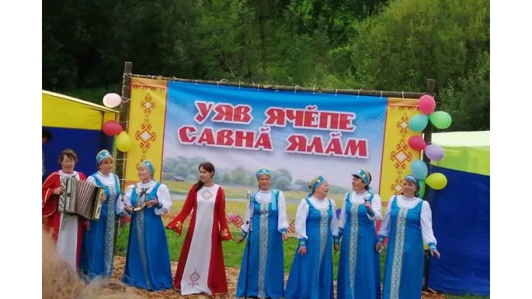 Выступление с концертной программой художественного коллектива «Турай Ен» напразднике День деревни в Больших Токшиках