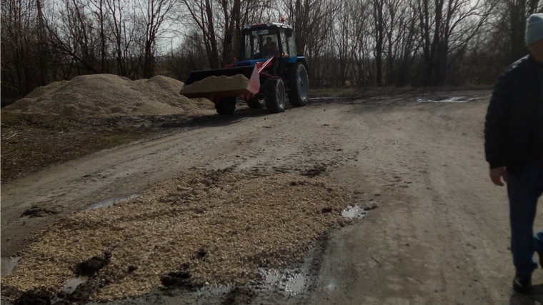 Ямочный ремонт дороги по переулку между улицами Ленина и Комсомольская, Партизанская и Советская.